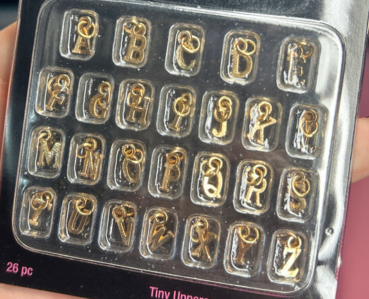 Initial charm to nail keychain